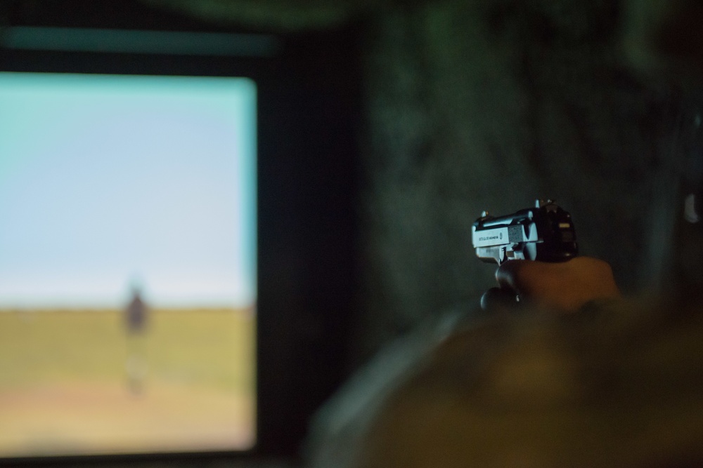 Dental Clinic Soldiers Practice Firing at the Engagement Skills Trainer