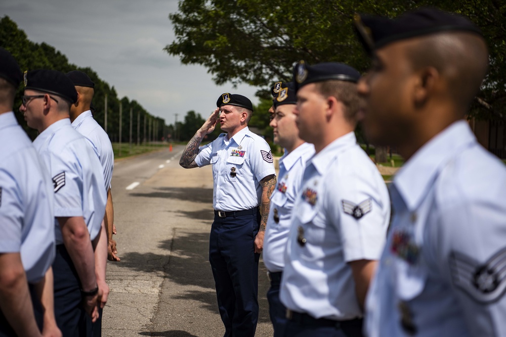 Security Forces Airman salutes