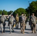 Members of Team Vance participate in a 5K ruck march