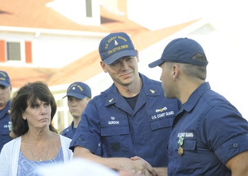 Coast Guard members receive awards, reunite with survivors of boat crash in Virginia Beach, Va.