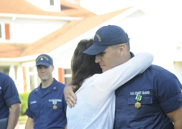 Coast Guard members receive awards, reunite with survivors of boat crash in Virginia Beach, Va.