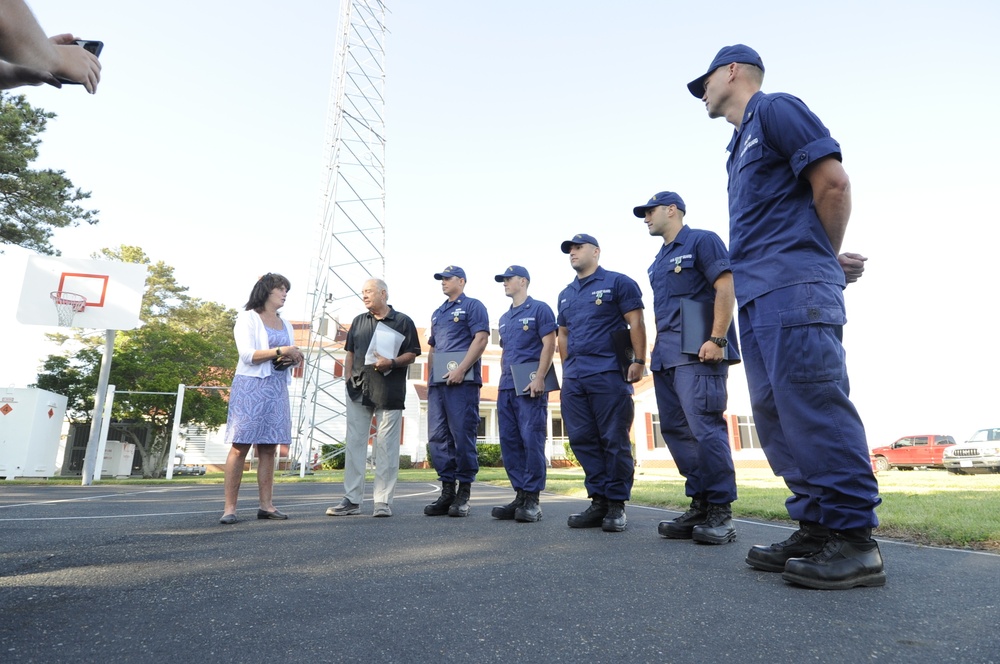 Coast Guard members receive awards, reunite with survivors of boat crash in Virginia Beach, Va.