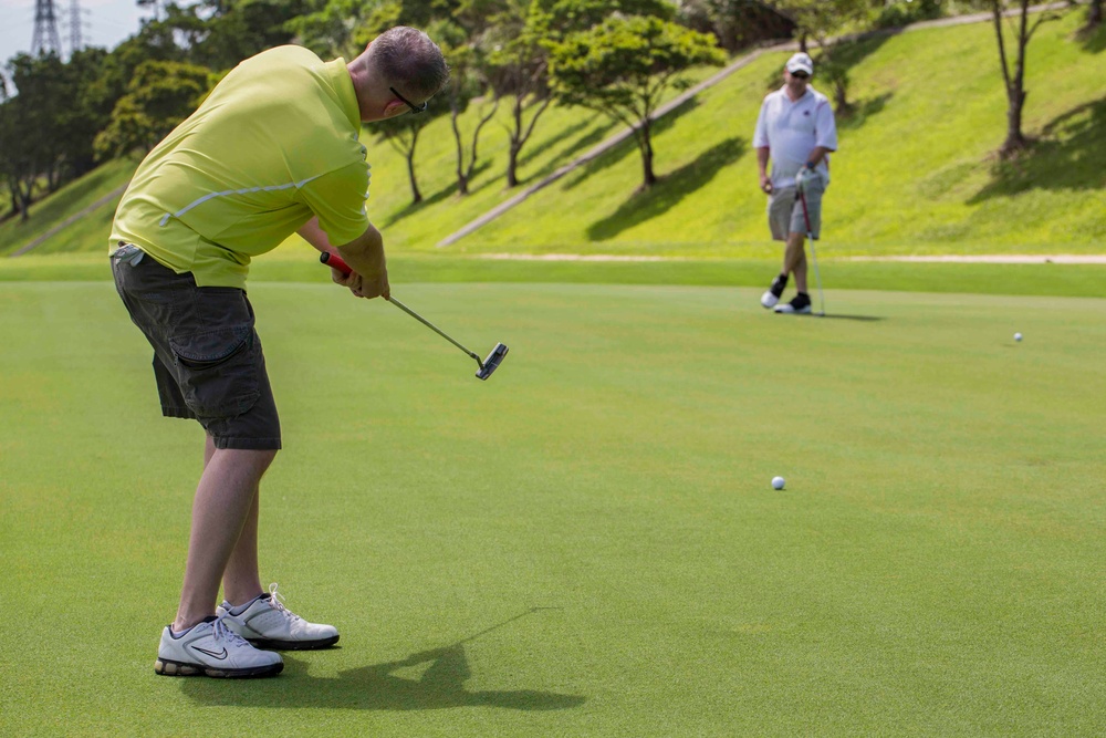 Marines with 3rd Marine Division compete in a golf tournament
