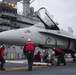 Nimitz Sailors Move Aircraft During Flight Deck Drill