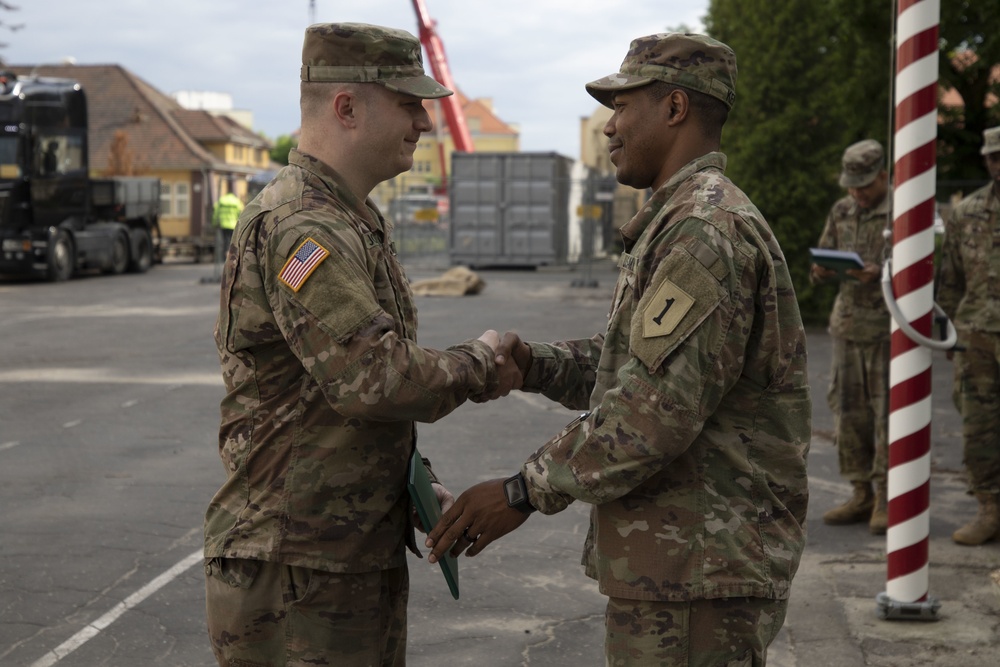 Soldier with the 1st Infantry Division Mission Command Element receives The Army Commendation Medal