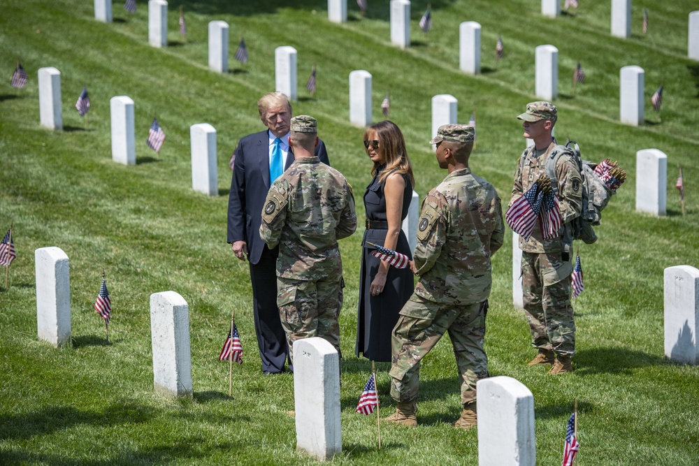 President Donald Trump and First Lady Melania Trump Visit Arlington National Cemetery During Flags-In