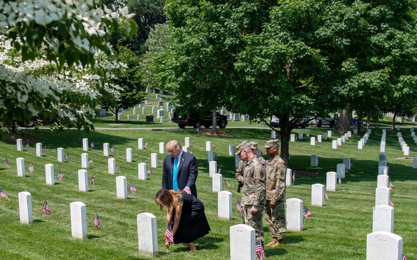 President Donald Trump and First Lady Melania Trump Visit Arlington National Cemetery During Flags-In