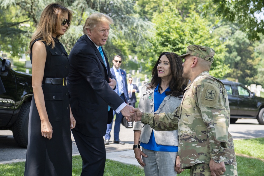 President Donald Trump and First Lady Melania Trump Visit Arlington National Cemetery During Flags-In