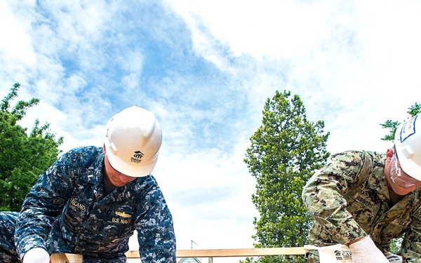 Service Members Renovate Home with Habitat for Humanity