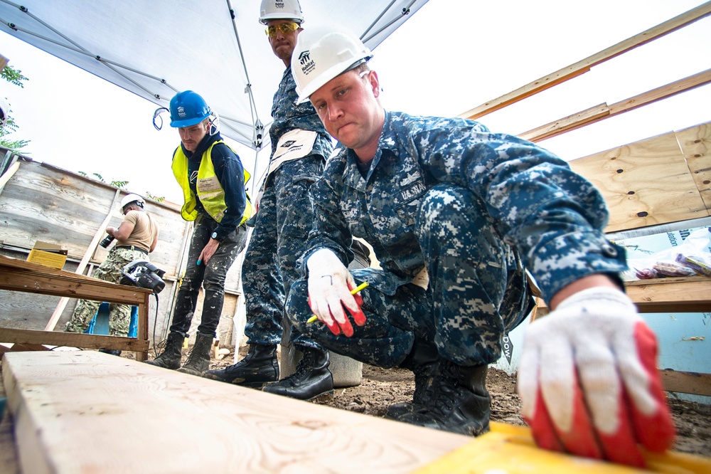 Service Members Renovate Home with Habitat for Humanity