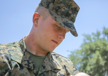 Marine graduate meets newborn son