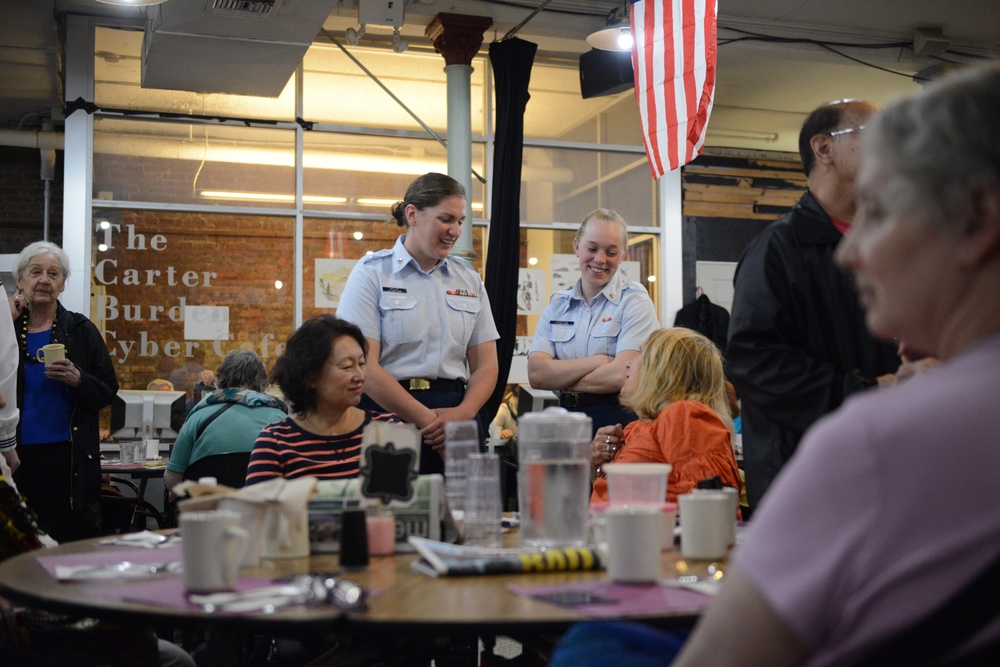Service members volunteer to serve meals to seniors at Carter Burden Center for the Aging