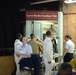 Service members volunteer to serve meals to seniors at Carter Burden Center for the Aging