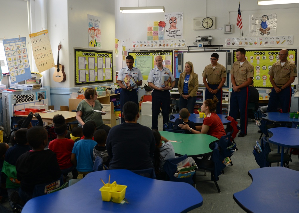 Service members volunteer to read books to students at Public School 188