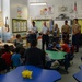 Service members volunteer to read books to students at Public School 188