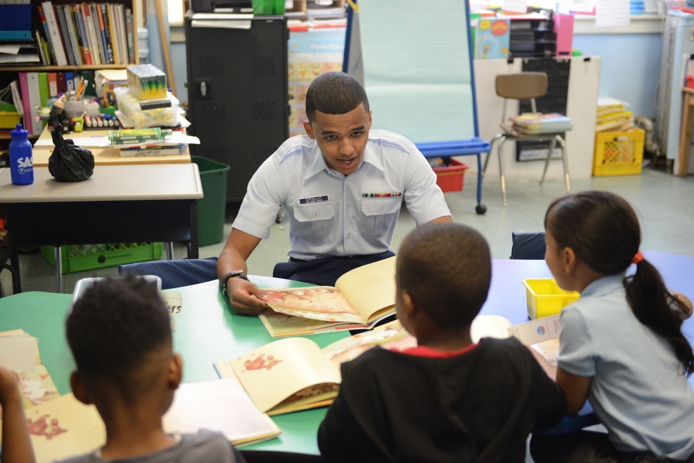 Service members volunteer to read books to students at Public School 188