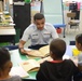 Service members volunteer to read books to students at Public School 188