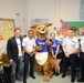 Service members volunteer to read books to students at Public School 188