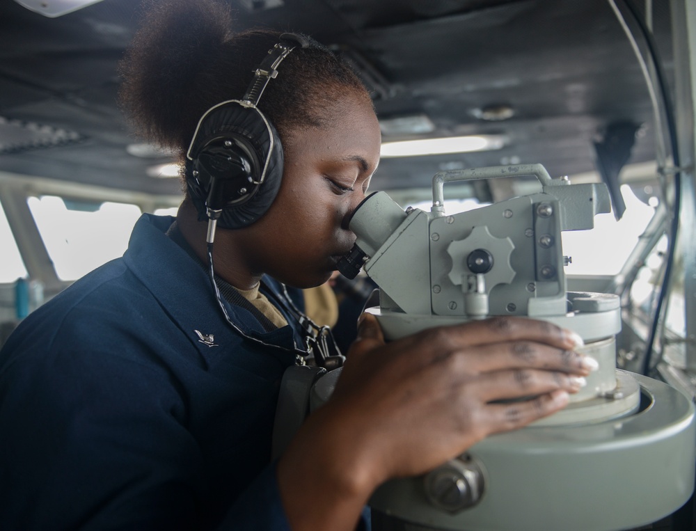 Nimitz Sailor Shoots Bearings on the Bridge