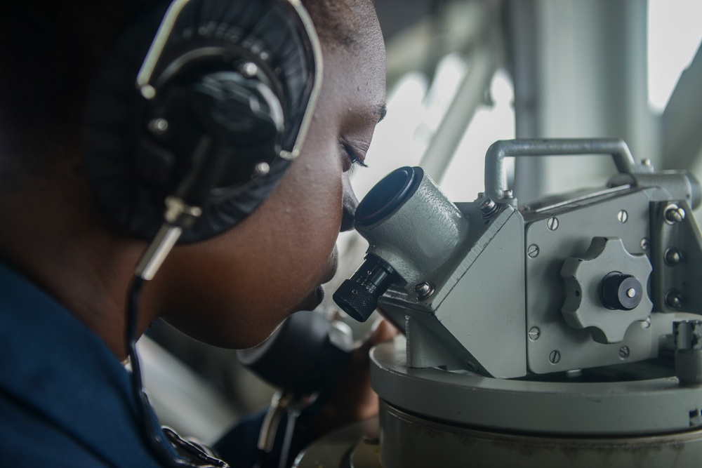 Nimitz Sailor Shoots Bearings on the Bridge