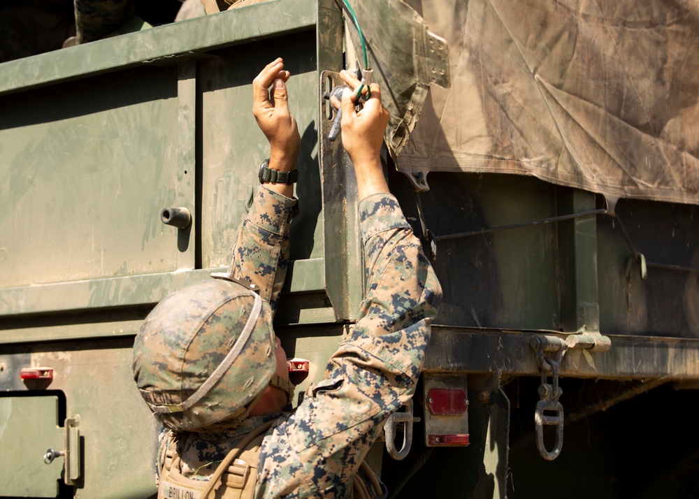 U.S. Marines convoy to a landing zone