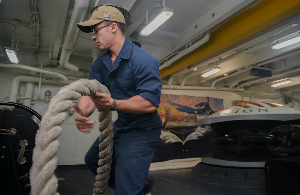 Nimitz Sailor Handles Mooring Line