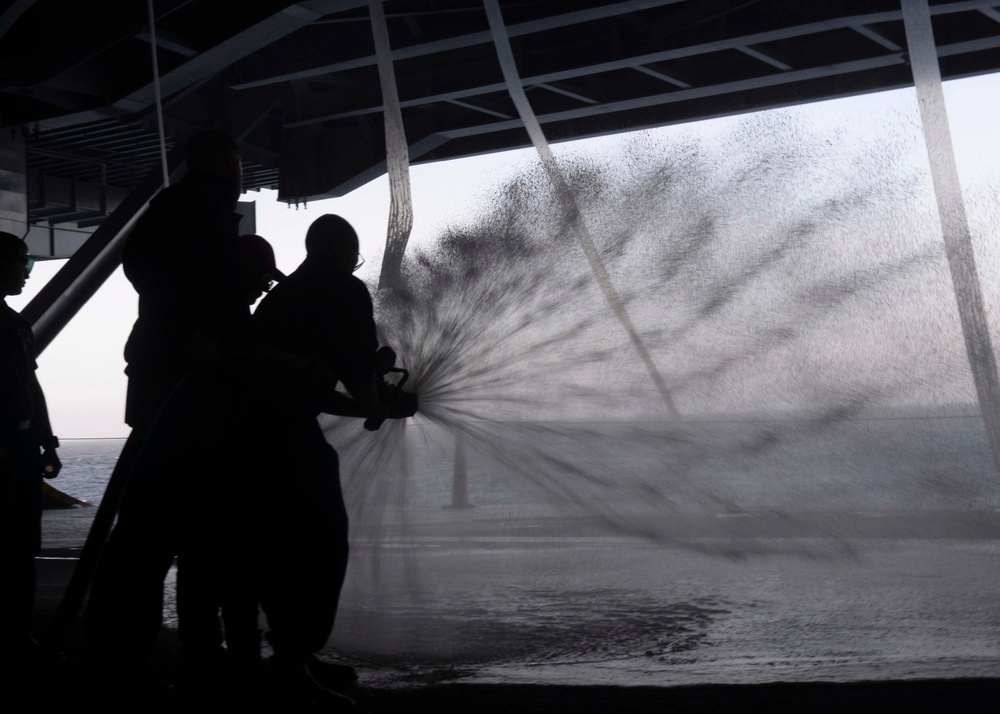 Nimitz Sailors Conduct Washdown