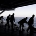 Nimitz Sailors Scrub Hangar Bay