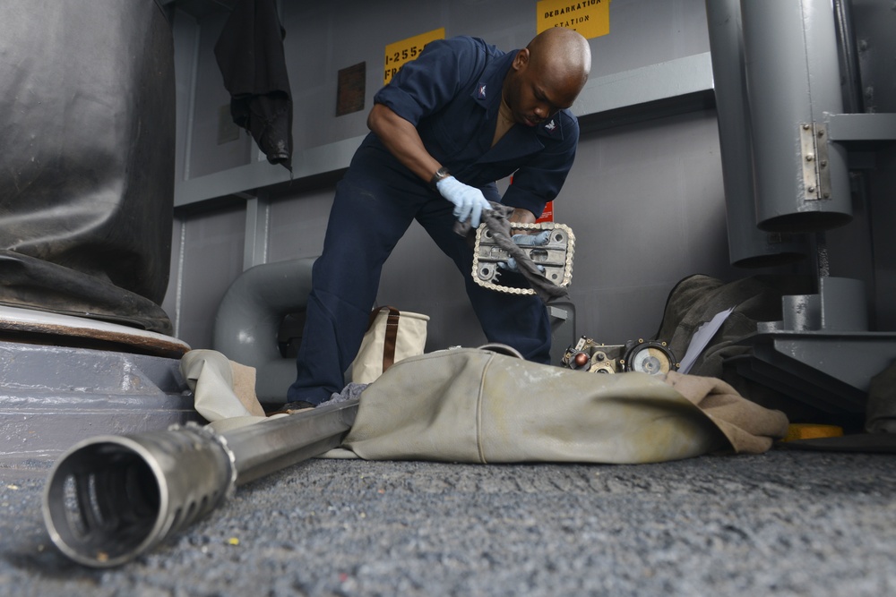 Nimitz Sailor Conducts Post Fire Maintennance on MK-38