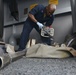 Nimitz Sailor Conducts Post Fire Maintennance on MK-38