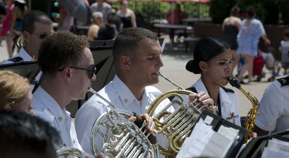 Two French Horns And A Saxophone