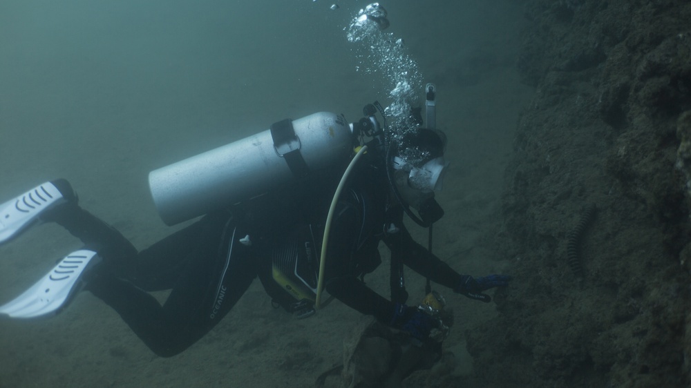 Okinawa divers clean the ocean floor at North Steps