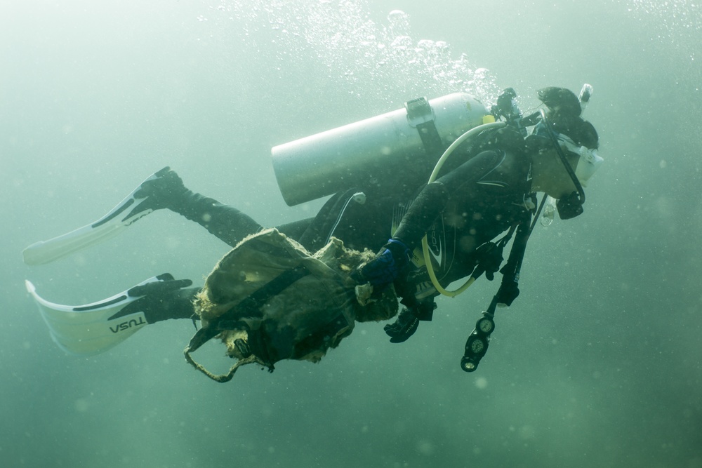 Okinawa divers clean the ocean floor at North Steps