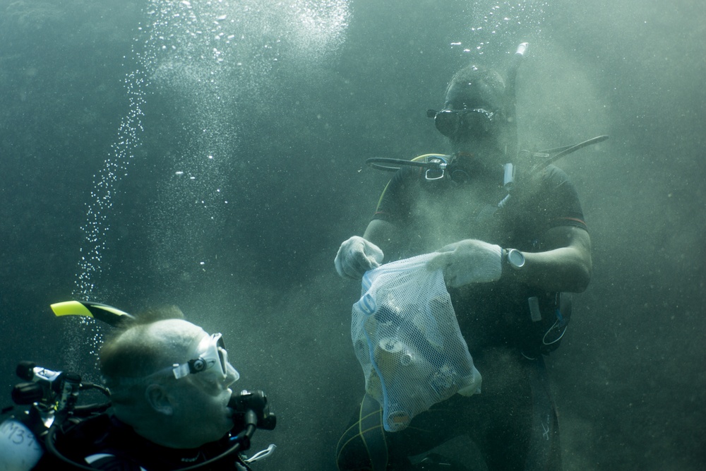 Okinawa divers clean the ocean floor at North Steps