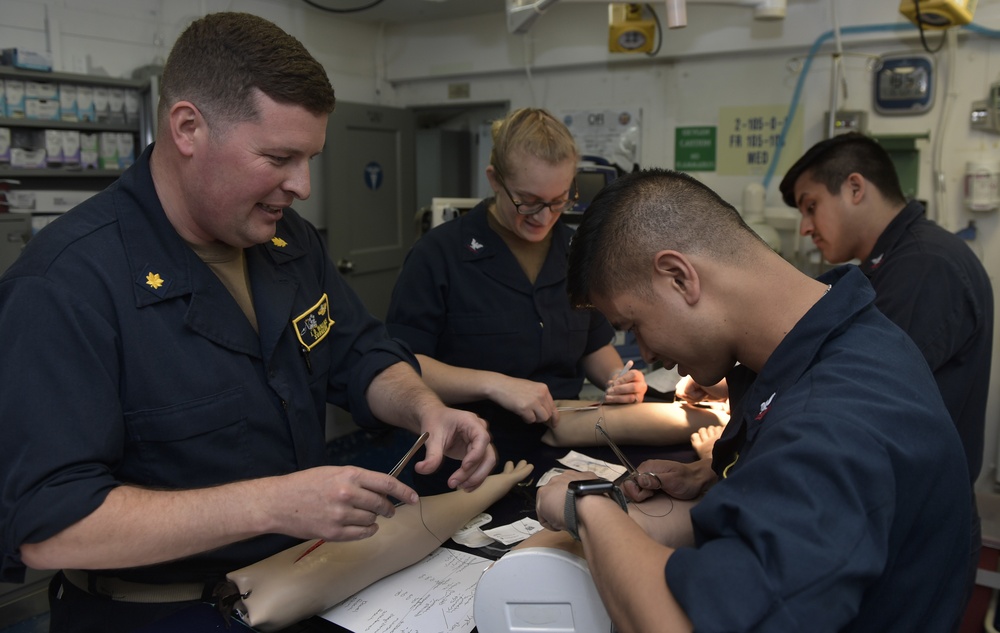 Nimitz Surgeon Trains Hospital Corpsman How To Suture