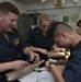 Nimitz Surgeon Trains Hospital Corpsman How To Suture