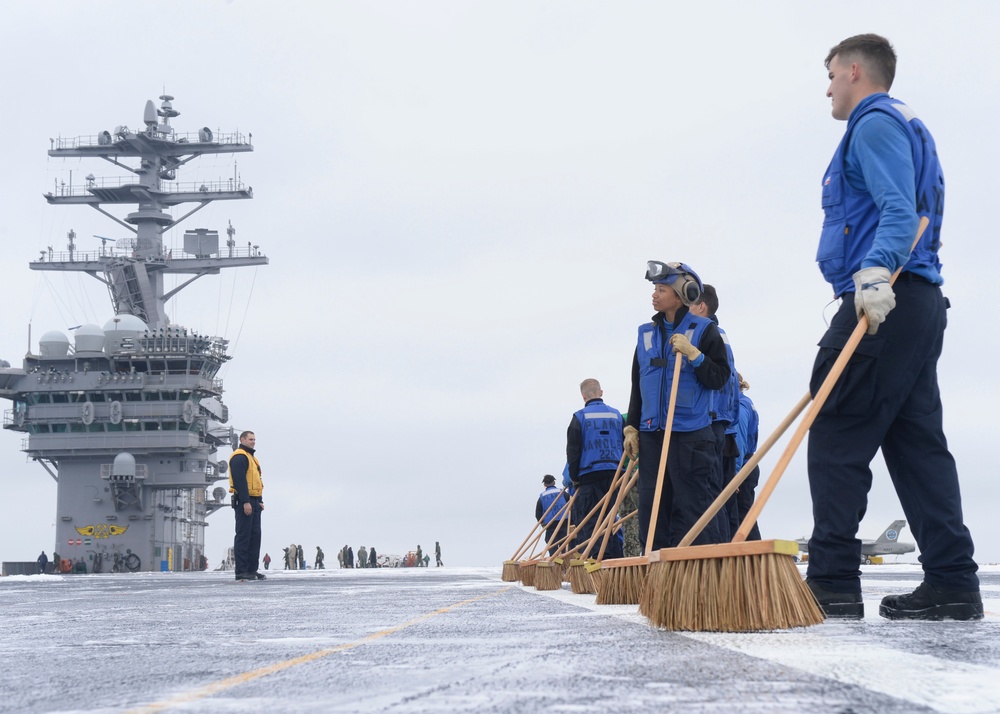 Nimitz Sailors Standby To Scrub The Flight Deck