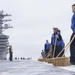 Nimitz Sailors Standby To Scrub The Flight Deck