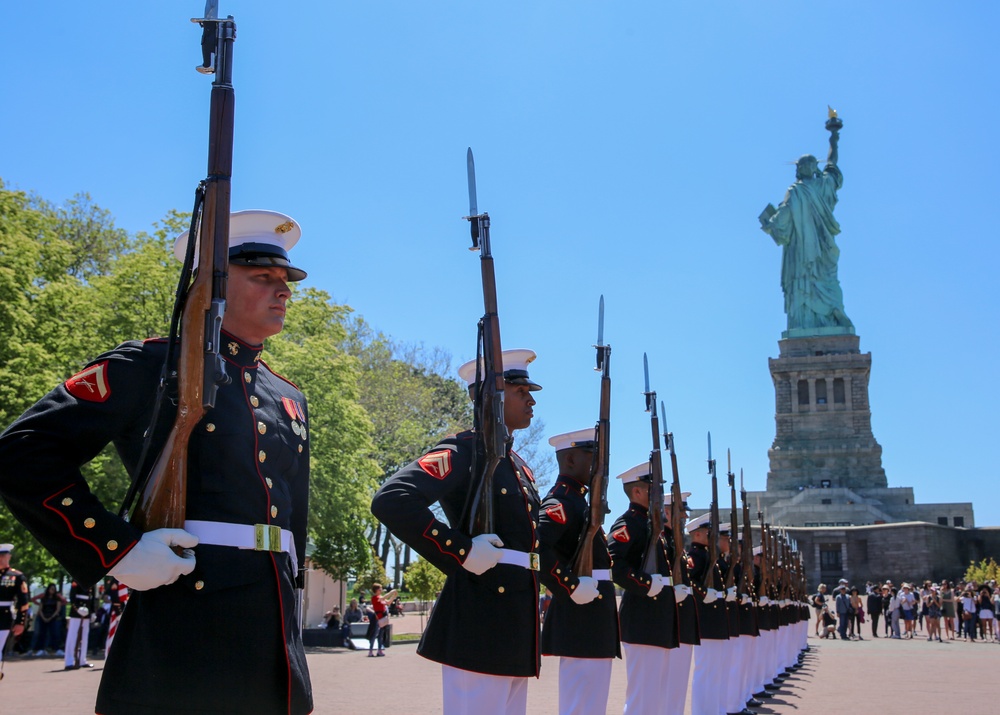 Marines perform at the Statue of Liberty