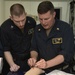 Nimitz Surgeon Trains Corpsman How To Suture