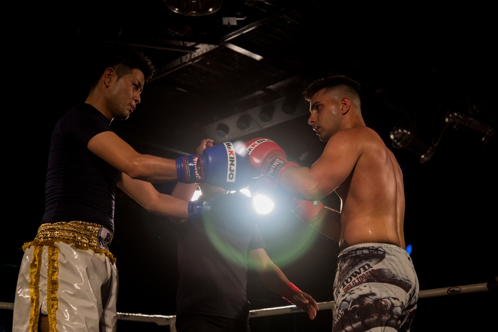 Sharing culture through mixed martial arts: Japanese, US kickboxers touch gloves to show sportsmanship