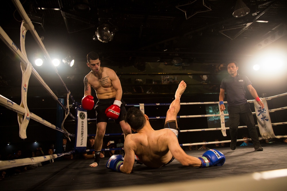 Sharing culture through mixed martial arts: Japanese, US kickboxers touch gloves to show sportsmanship