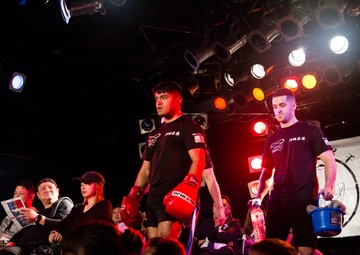Sharing culture through mixed martial arts: Japanese, US kickboxers touch gloves to show sportsmanship