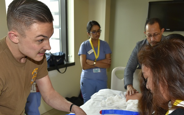 Navy Corpsman instructs during National Nurses Week 2019