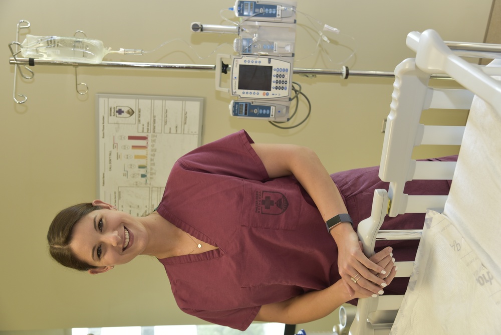 Hannah Sasscer, RN, poses in a PICU room