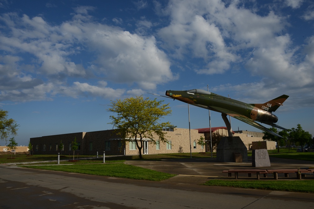 F-100 in front of the new consolidated support building