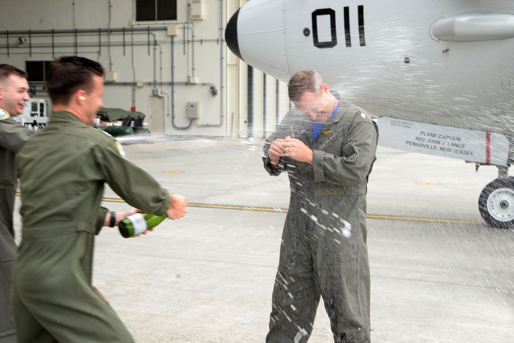 Cmdr Robert Wilkerson celebrates his final flight as Commanding Officer of Patrol Squadron (VP) 5.