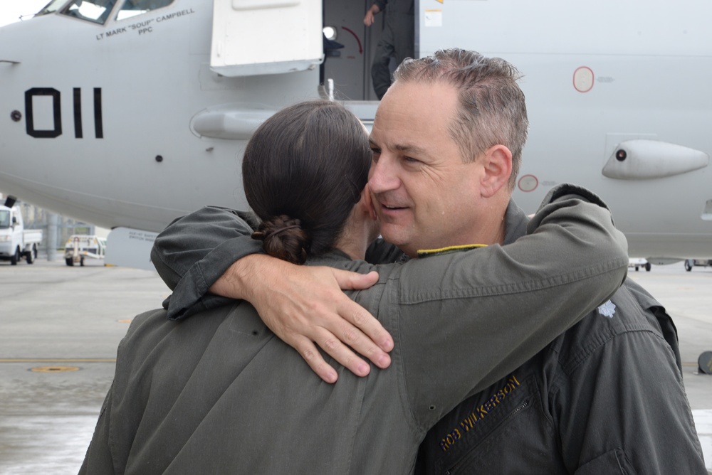 Cmdr. Robert Wilkerson celebrates with his fellow Sailors after his Final Flight as Commanding Officer of Patrol Squadron (VP) 5.