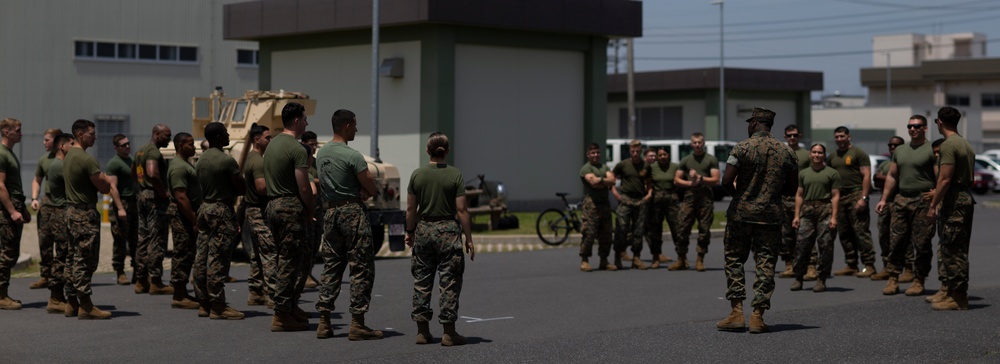 MAG-12 conducts Humvee push for 1st MAW warrior games