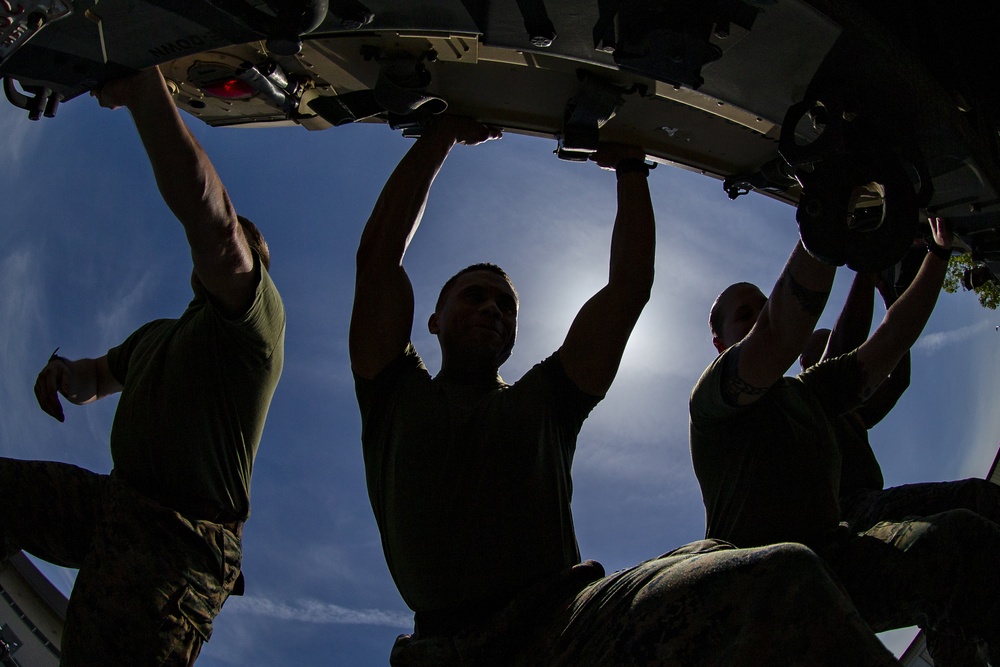 MAG-12 conducts Humvee push for 1st MAW warrior games